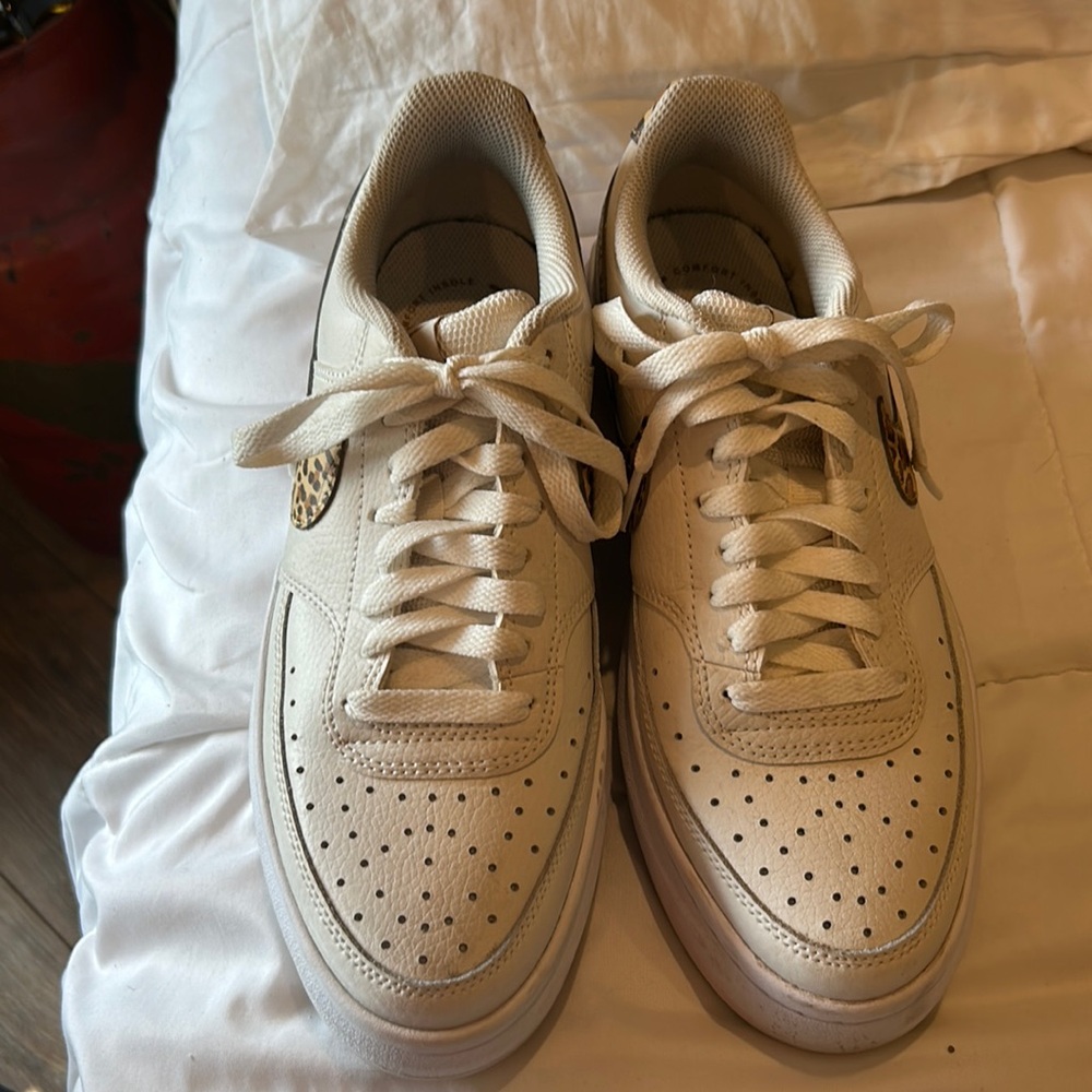 Womens white Nike with cheetah stripe